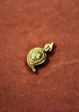Engraved Manoge Motif Pendant