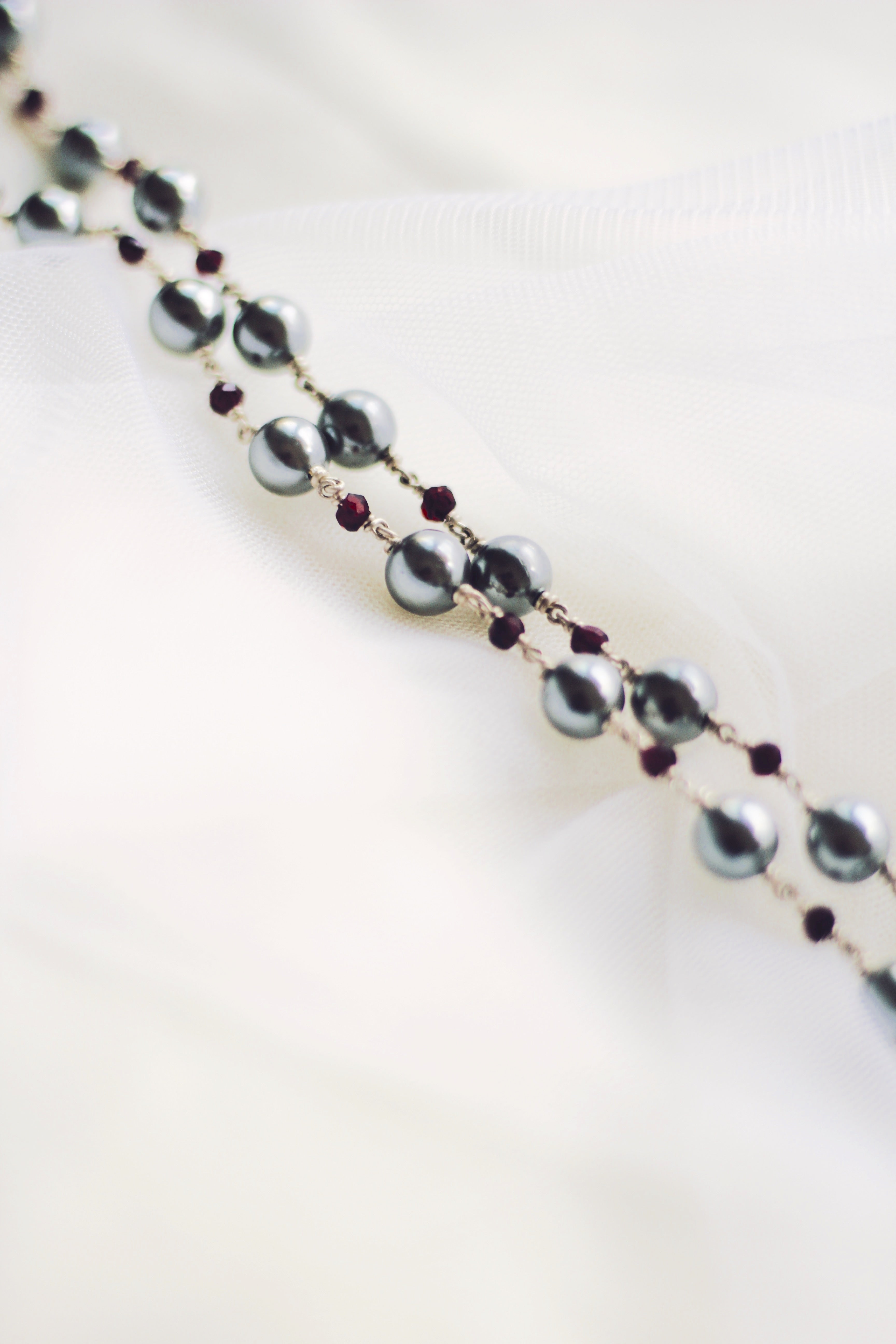 Grey Pearl With Garnet Beads