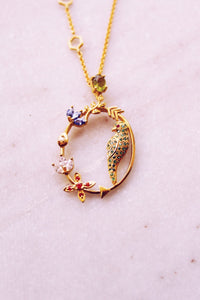 Peridot Studded In Circular Arrow With Kamadeva’s 5 Flowers Necklace (Gold-plated)