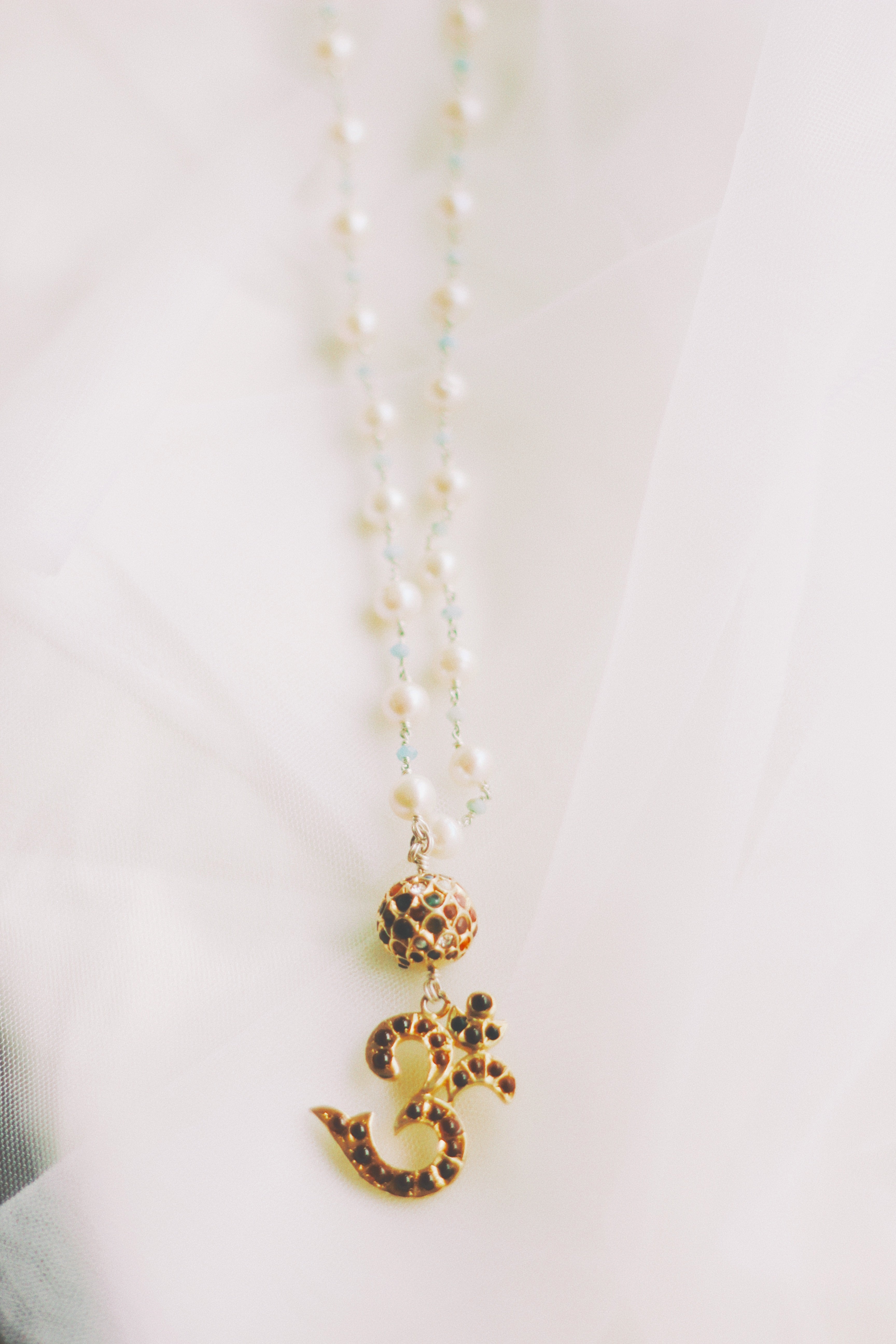 White Pearl String With Bikaner Beads Om Pendant