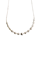Lunar Cycle Beaten Silver Arc Necklace