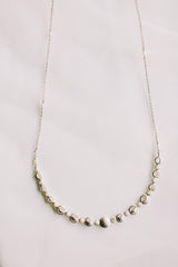 Lunar Cycle Beaten Silver Arc Necklace