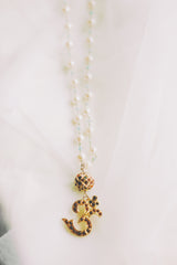White Pearl String With Bikaner Beads Om Pendant